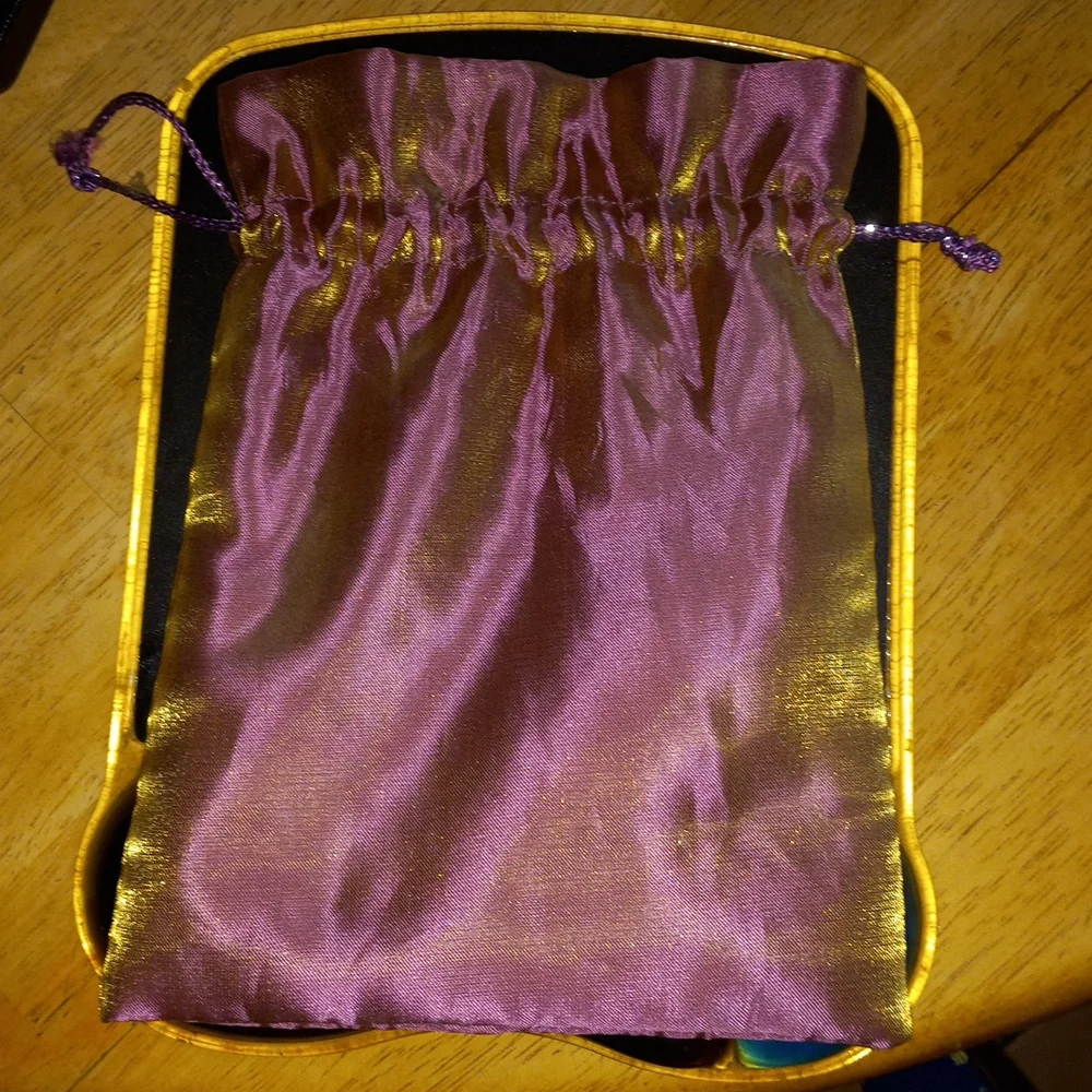 6x8 pretty detail flowers silky like material bag string closure.